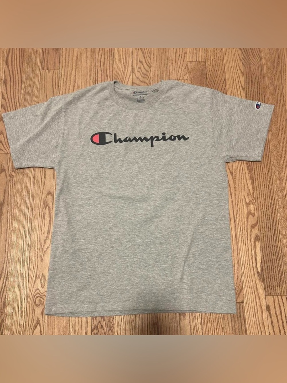 Champion Tee